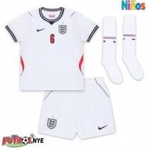 Camiseta Inglaterra Marc Guehi #6 Primera Equipación para niños Mundial 2026 manga corta (+ pantalones cortos)